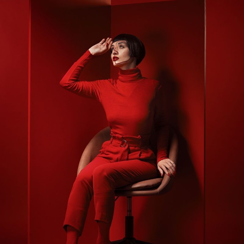 thinking-fashion-and-a-model-woman-on-red-backgro-2026-01-09-10-02-03-utc1.jpeg